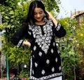 black short kurti featuring intricate white floral Chikankari