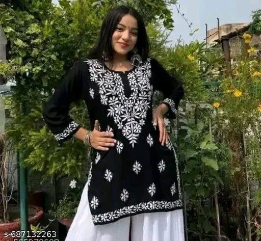 black short kurti featuring intricate white floral Chikankari